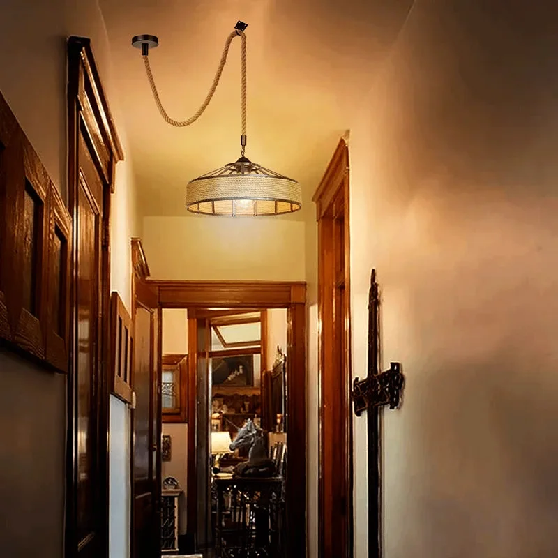 Modern industrial hemp rope pendant light with black metal shade and E27 bulb pendant light fitting hanging from ceiling