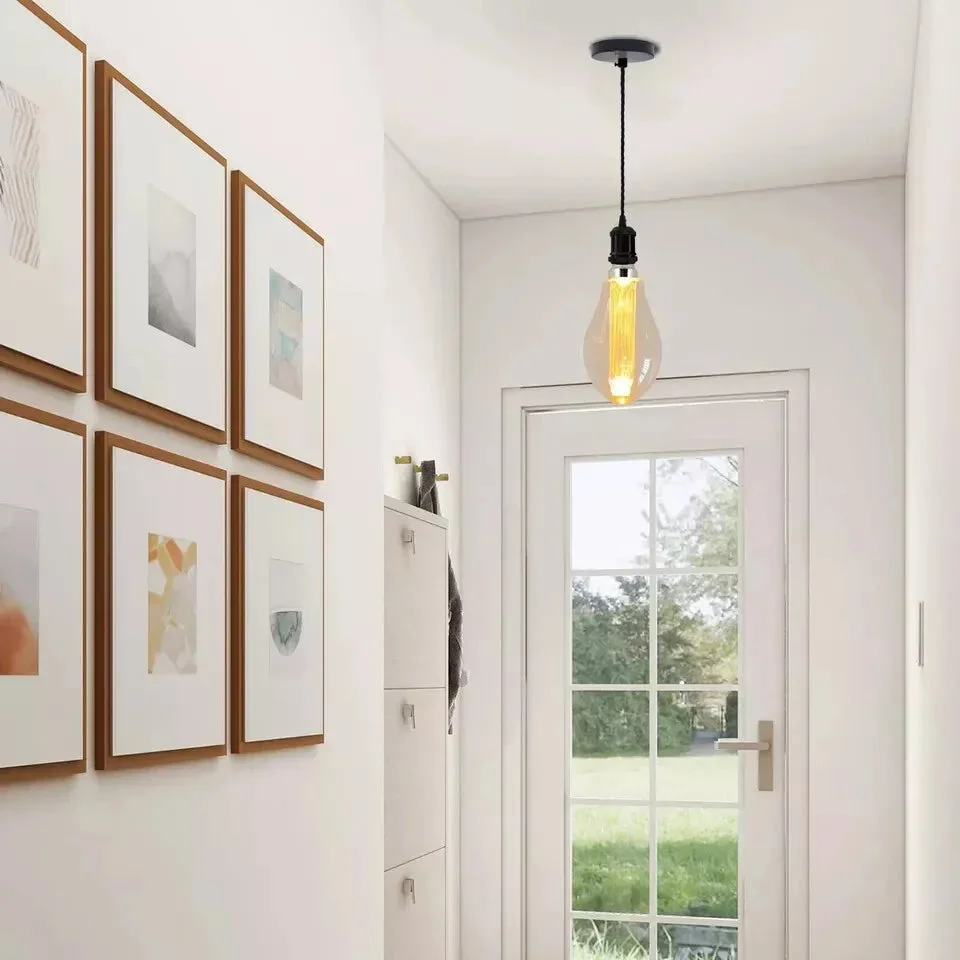 Vintage style E27 LED bulb with warm white filament, 3W power, and antique glass finish for indoor use.