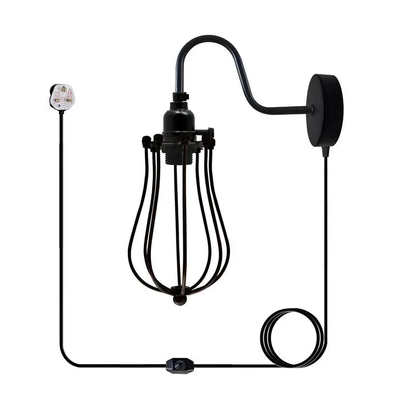 Black vintage industrial wall light with metal wire cage, E27 socket, and 4m plug-in cable hanging on white wall