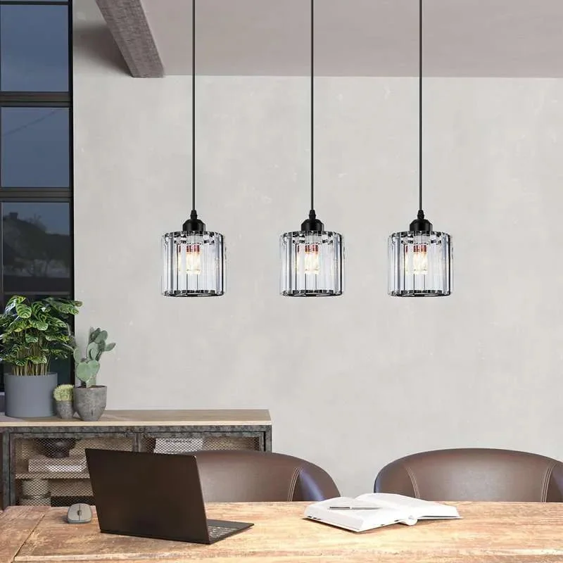 Modern linear crystal pendant light with rectangular clear K9 crystal shade and chrome metal ceiling rose hanging from adjustable cable