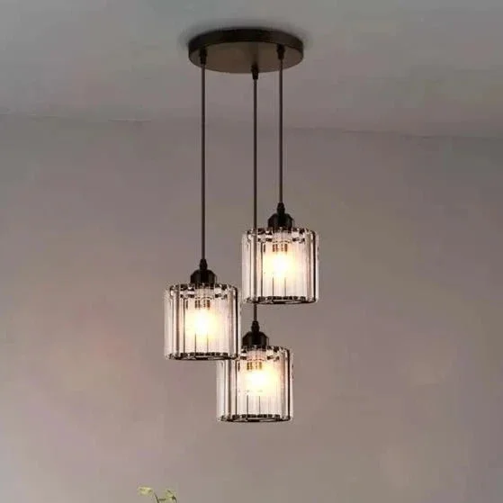Modern crystal pendant light with three clear K9 crystal glass shades and black metal ceiling rose, ceiling mounted design