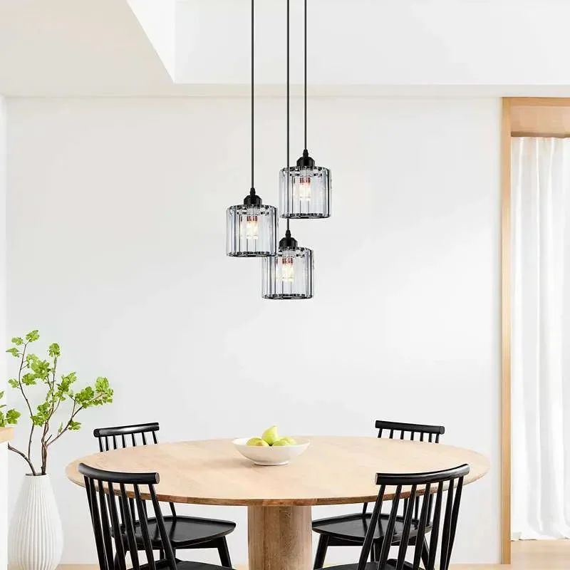 Modern crystal pendant light with three clear K9 crystal glass shades and black metal ceiling rose, ceiling mounted design