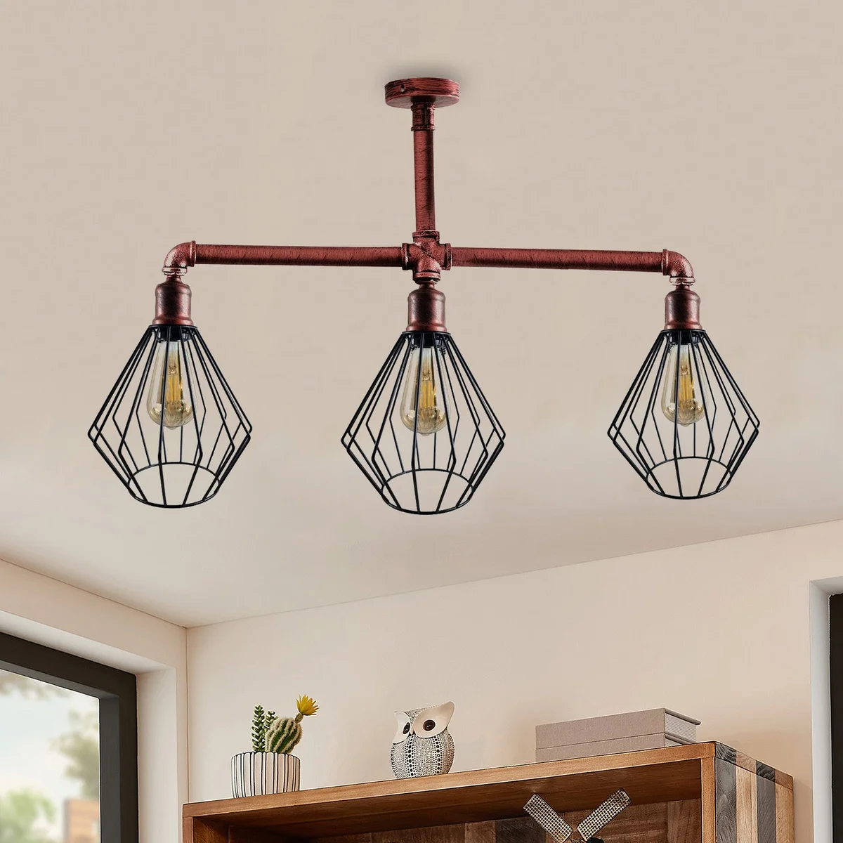 Vintage 3-way industrial pipe ceiling light with metal cage shades and exposed pipe arms in brushed copper finish