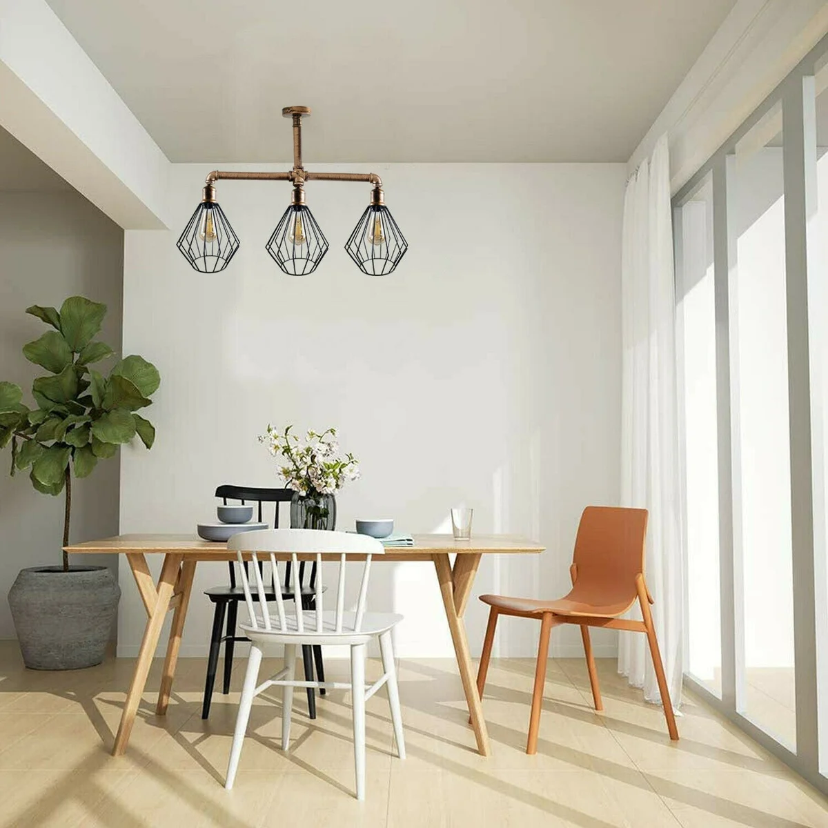 Vintage 3 way ceiling light with three metal pipe arms and cage shades in brushed copper finish hanging from ceiling