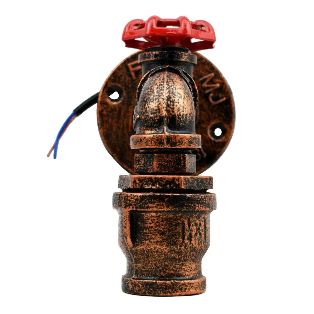 Rustic red steampunk wall sconce with industrial water pipe design and red valve detail mounted on white wall
