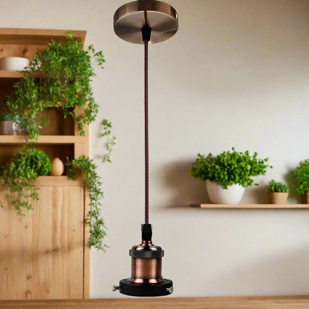 Vintage pendant light with polished copper holder and braided fabric cable, 1m length, ceiling rose included, no bulb.