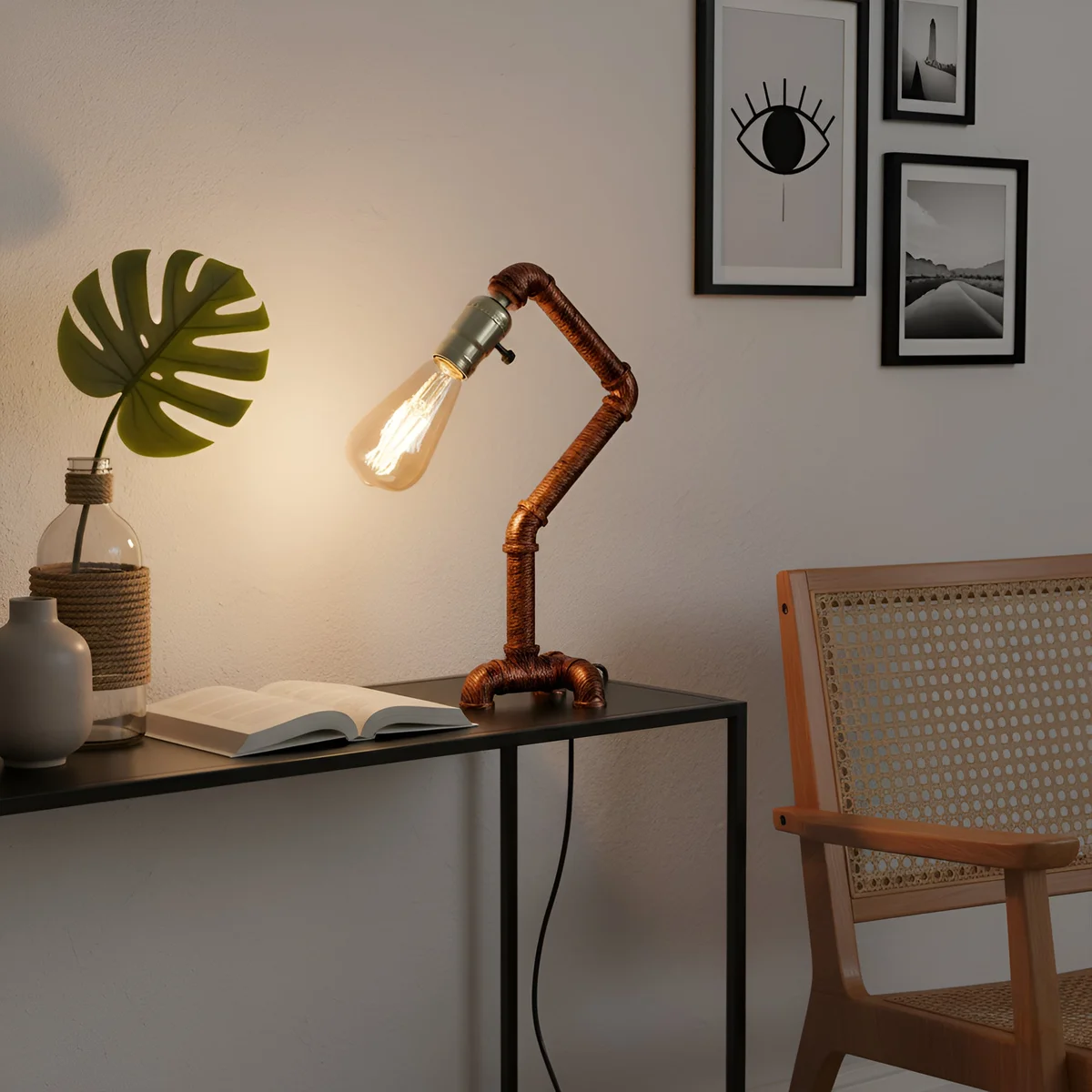 Rustic red steampunk table lamp made from metal water pipes with dual switches and weighted base on white background