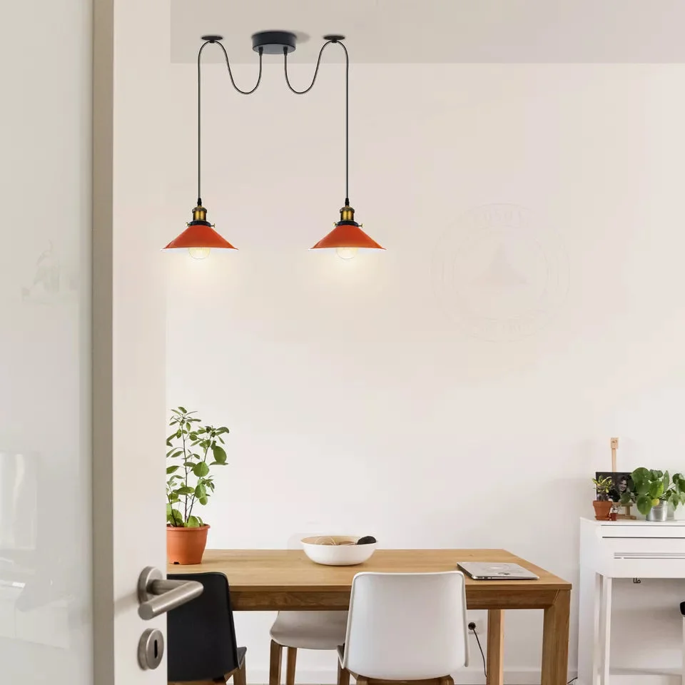 Red metal cage pendant with two adjustable suspension cables and E27 bulb holders hanging from ceiling plate