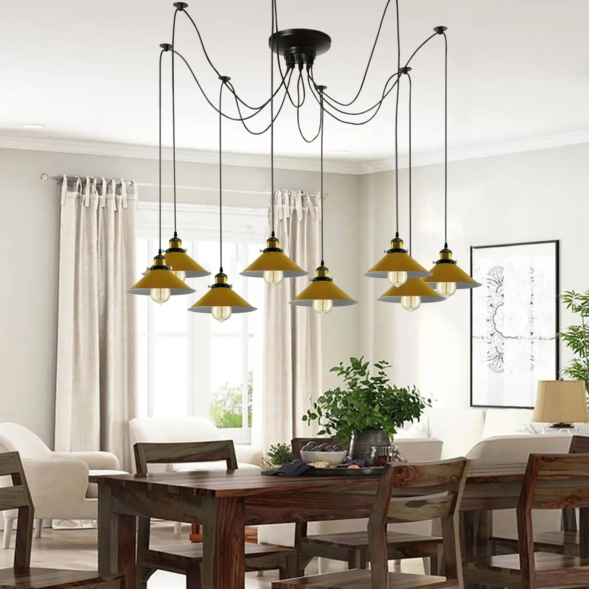 Modern large retro spider chandelier with 8 yellow metal shades and Edison-style filament bulbs hanging from ceiling