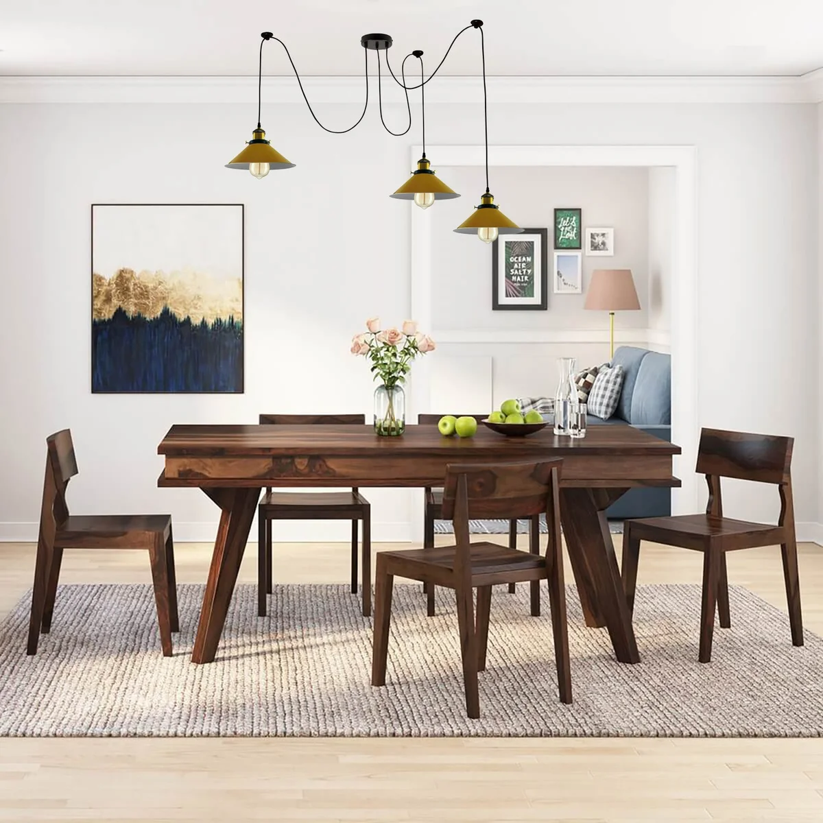 Modern large adjustable ceiling lamp with three yellow cone shades and braided wires hanging from ceiling rose