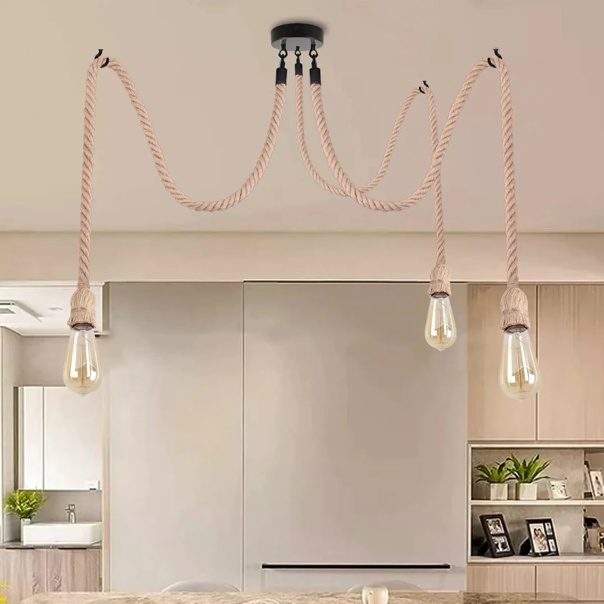 Industrial 3 bulb ceiling light with black metal frame and hemp cord hanging pendant design against white background