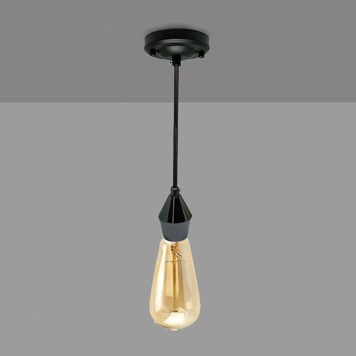 Black E27 ceiling pendant light with braided cable and yellow brass fixture, suitable for home and cafe lighting.