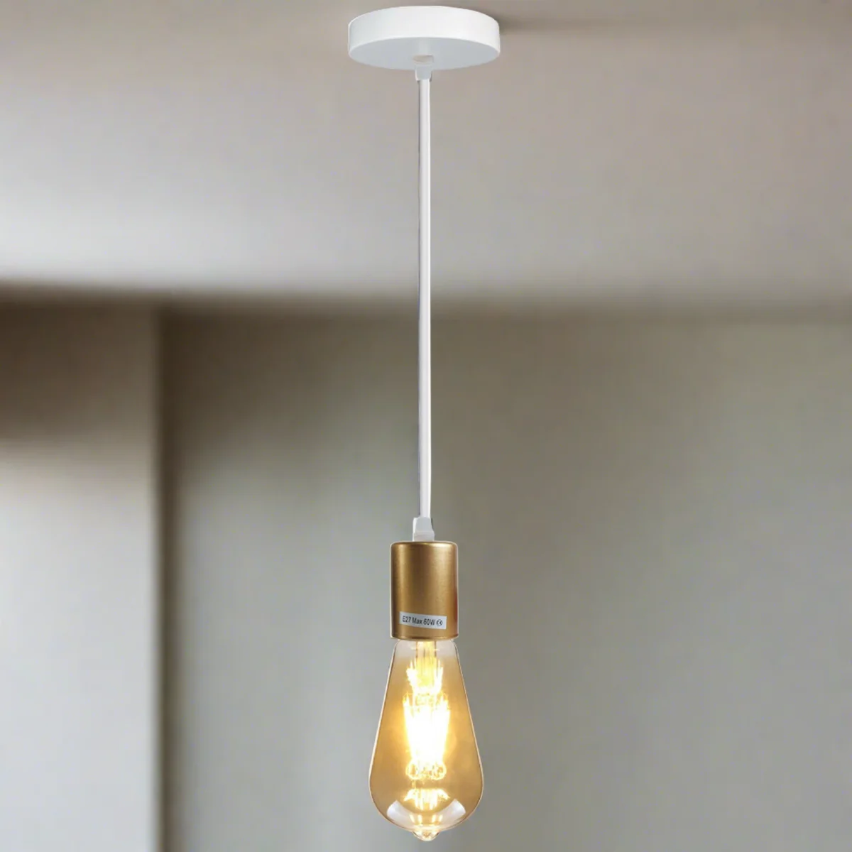 Gold ceiling light fitting with industrial pendant design, E27 bulb holder, metal and PVC construction, 95cm wire length