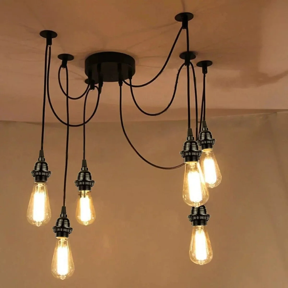 Industrial black spider pendant light fixture with six adjustable arms and E27 bulb holders hanging from ceiling plate