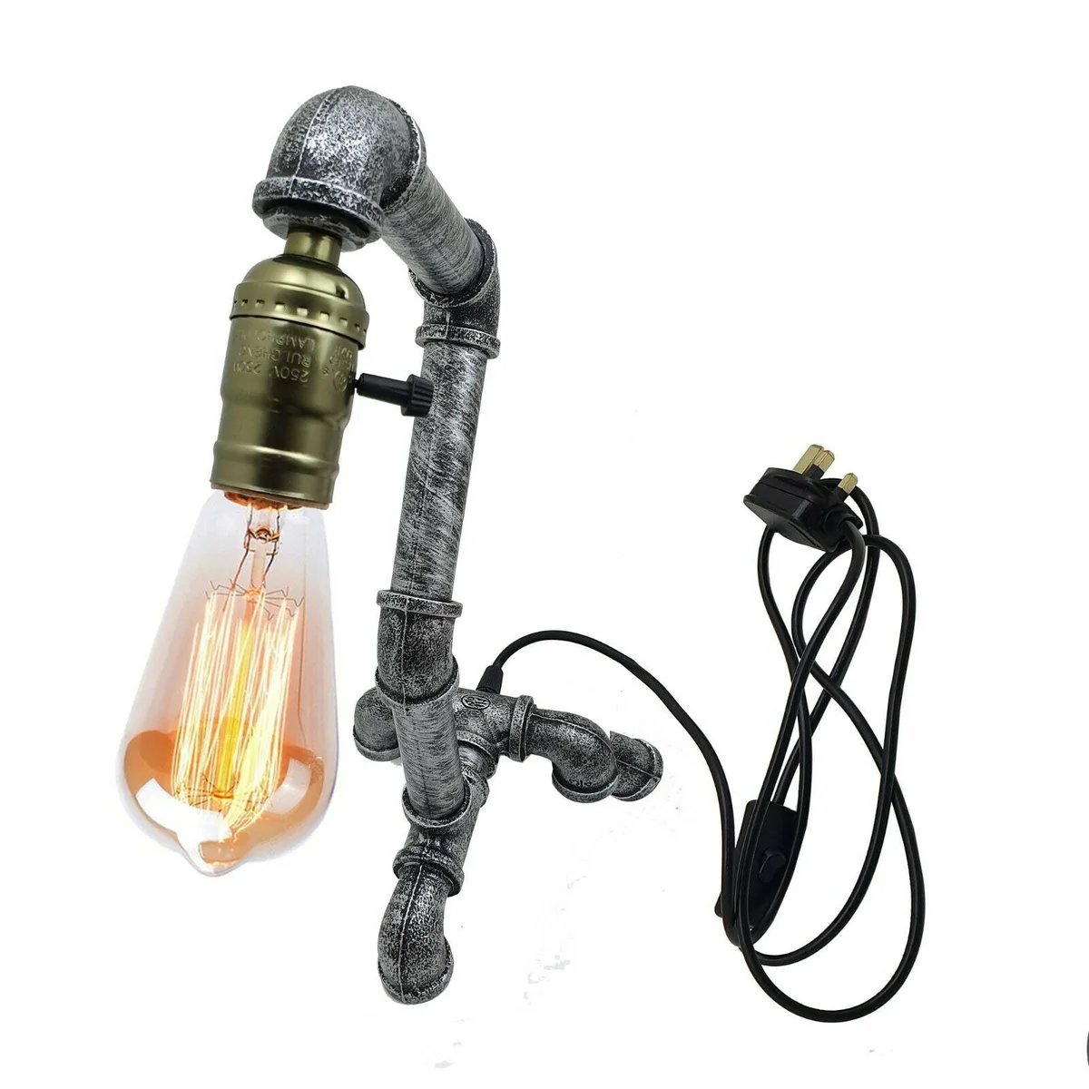 Brushed silver industrial pipe table lamp with vintage steampunk water-pipe design and in-line on/off switch on wooden surface