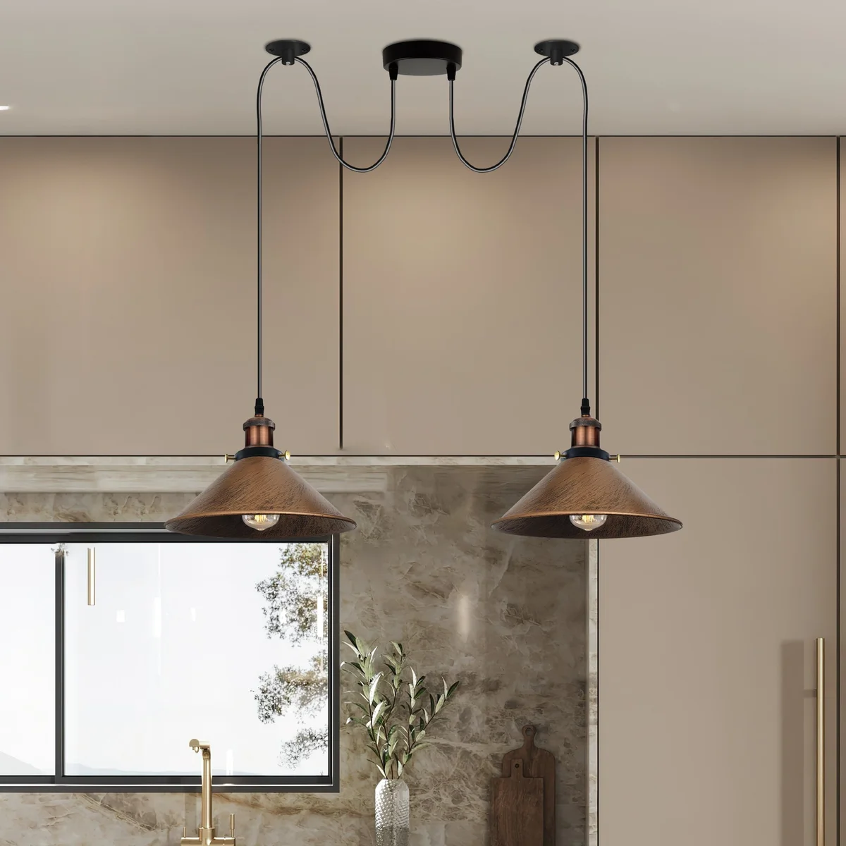 Brushed copper 2 way hanging lamp with two metal shades and long PVC cables against a white background