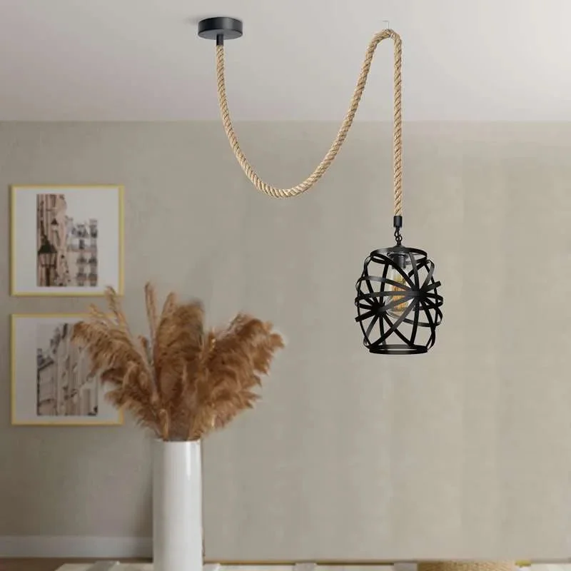 Black metal cage pendant light with adjustable hemp rope ceiling light hanging from a white ceiling mount