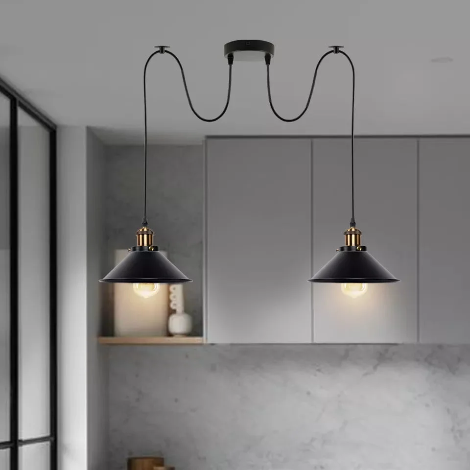 Two-way industrial ceiling pendant light with metal cage shades and adjustable hanging cables against white background