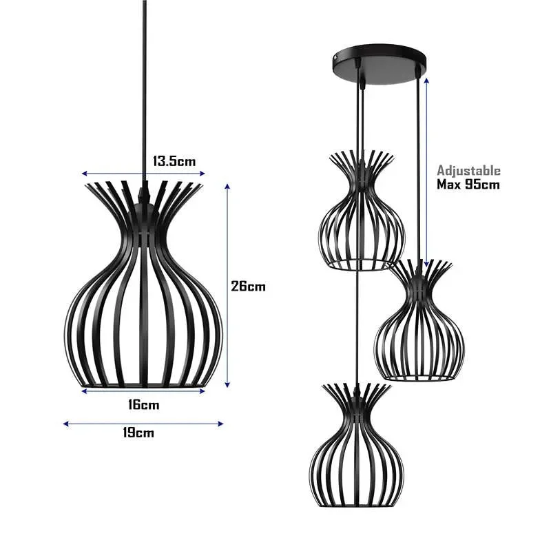 Black metal cluster pendant light with three wire cage shades hanging above a dining table in modern industrial style