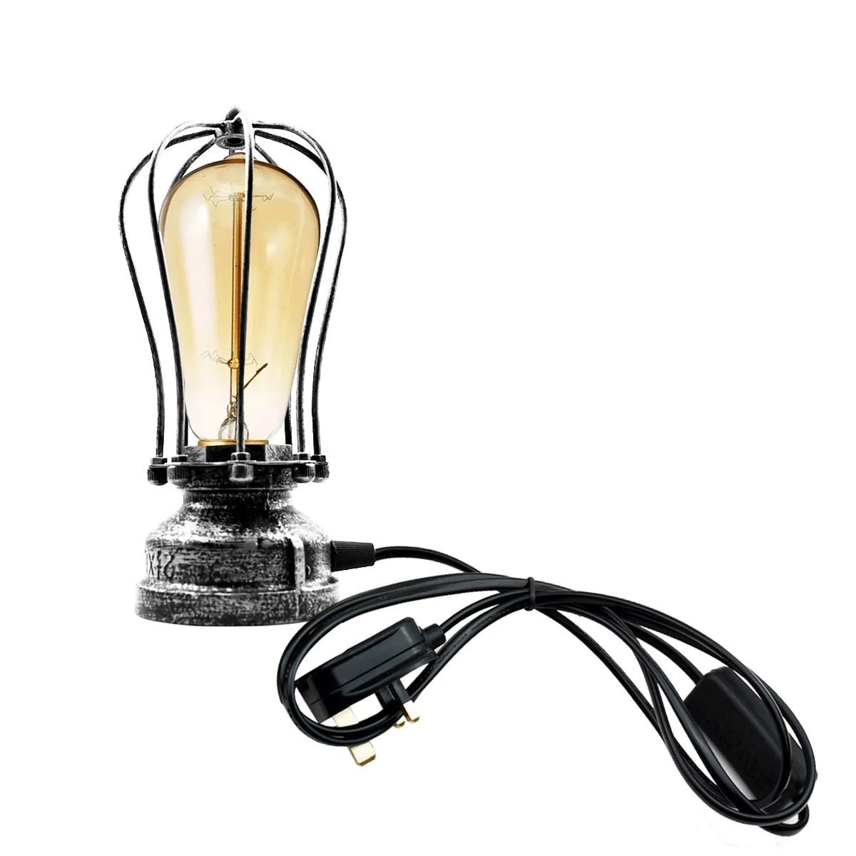 Compact industrial table lamp with black metal cage shade and visible E27 bulb, plug-in with inline switch on wooden surface