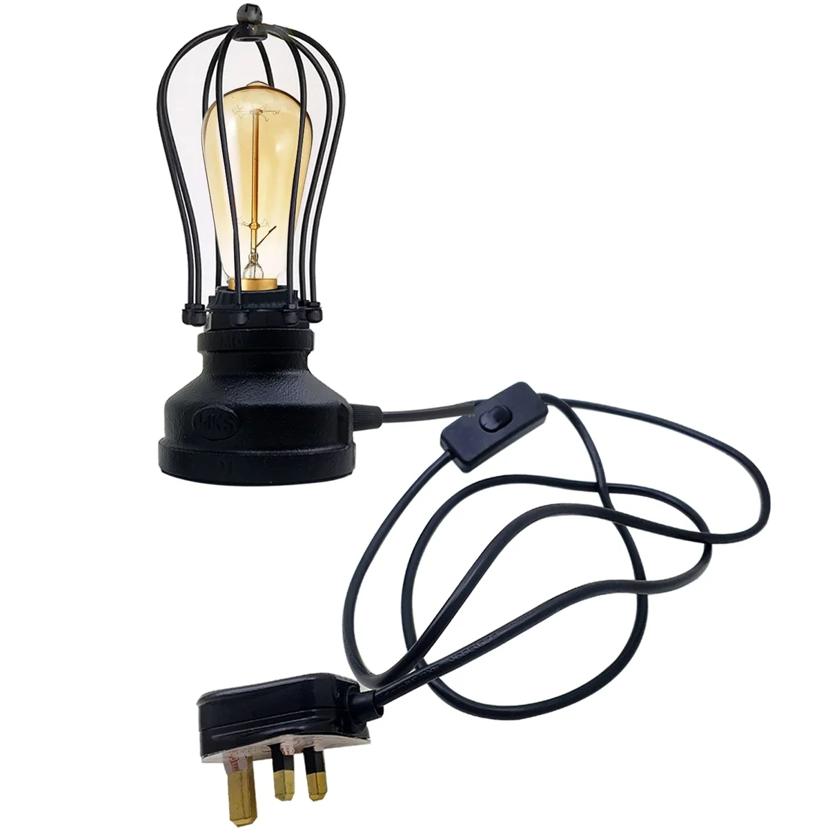 Compact industrial table lamp with vintage metal cage shade in brushed copper finish on wooden surface