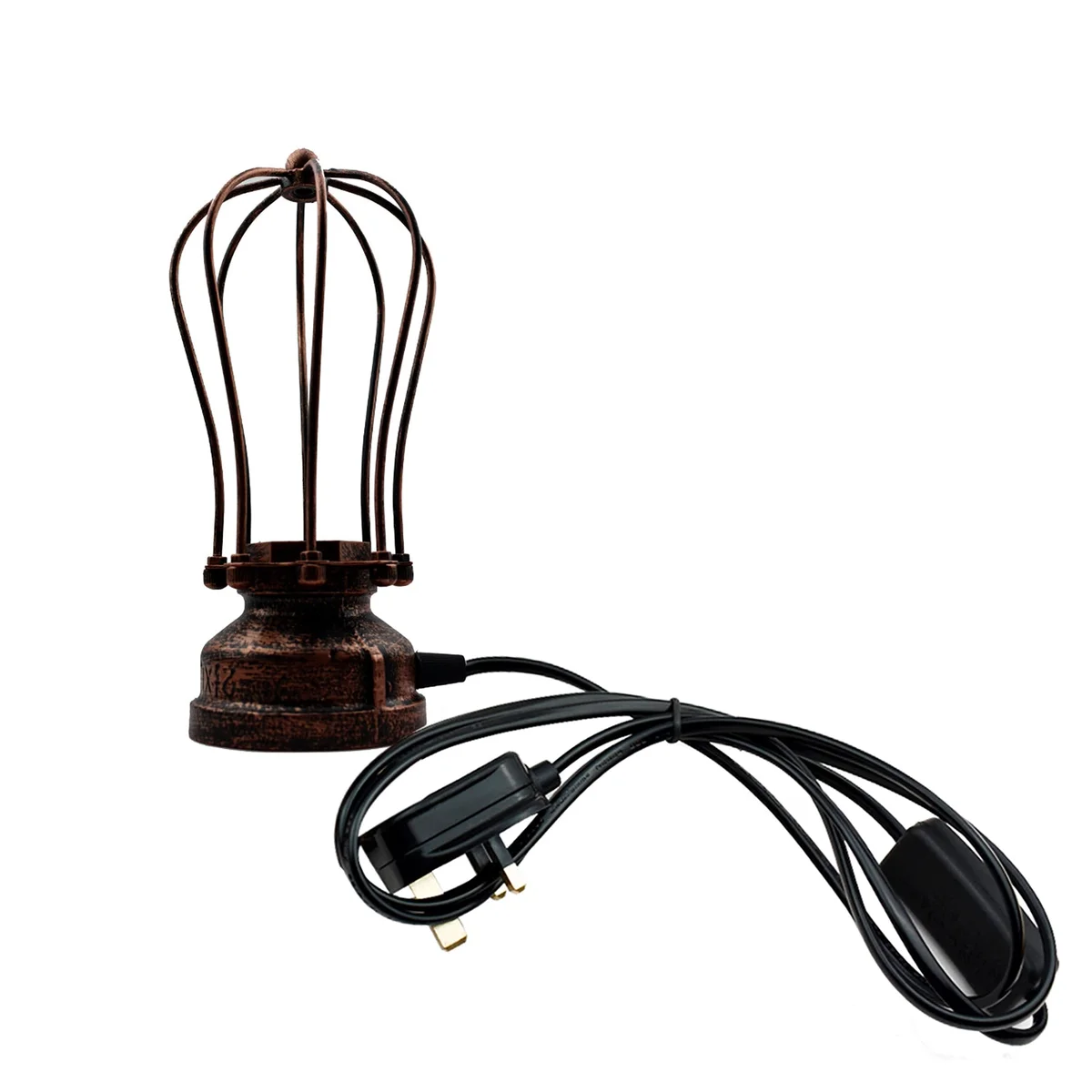 Compact industrial table lamp with metal cage shade in brushed copper finish on wooden surface against white wall