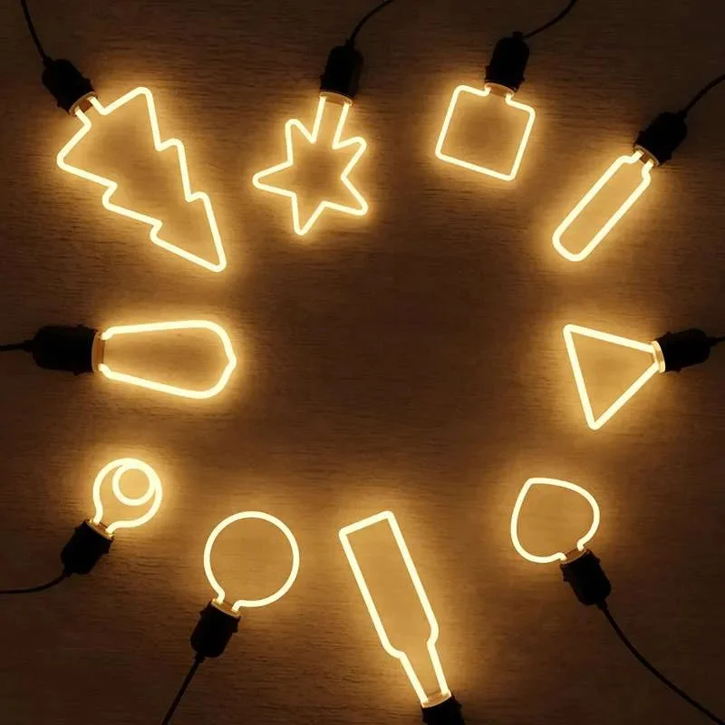 Transparent 4W LED filament bulb with curly tube design and E27 screw base glowing warm white light