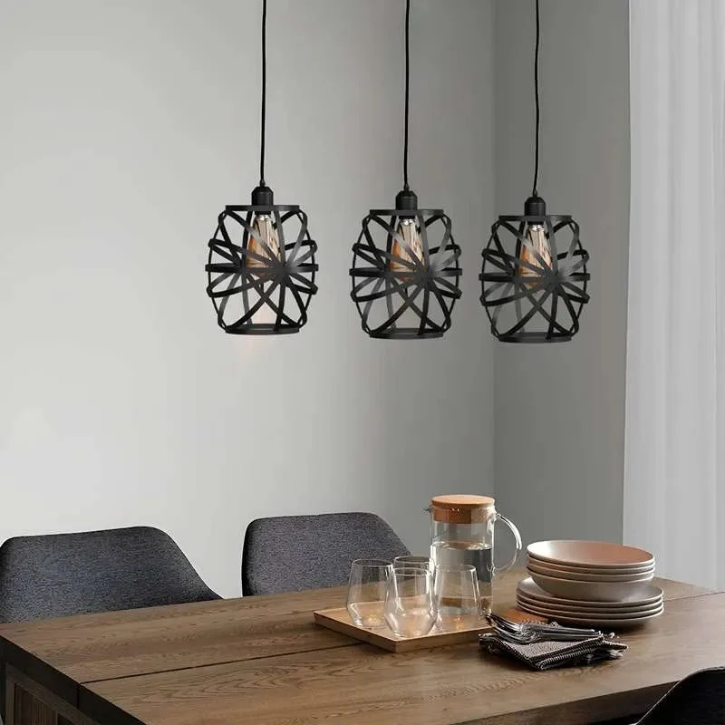 Vintage industrial ceiling pendant light with three black wire cage shades and linear canopy, metal construction
