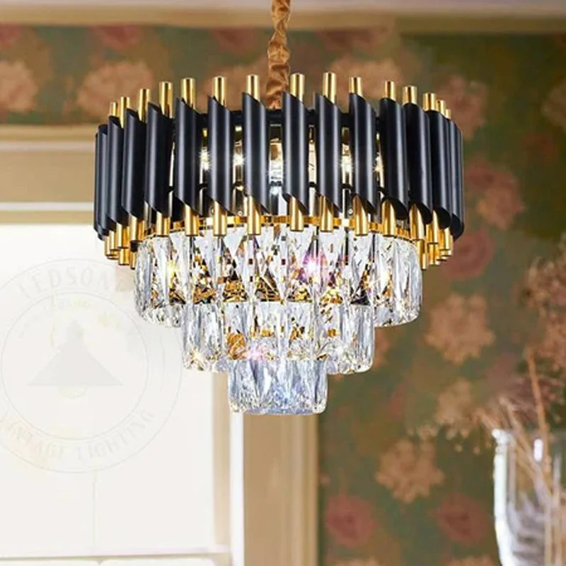 Modern black and gold chandelier with hanging clear crystal accents and adjustable chain ceiling mount