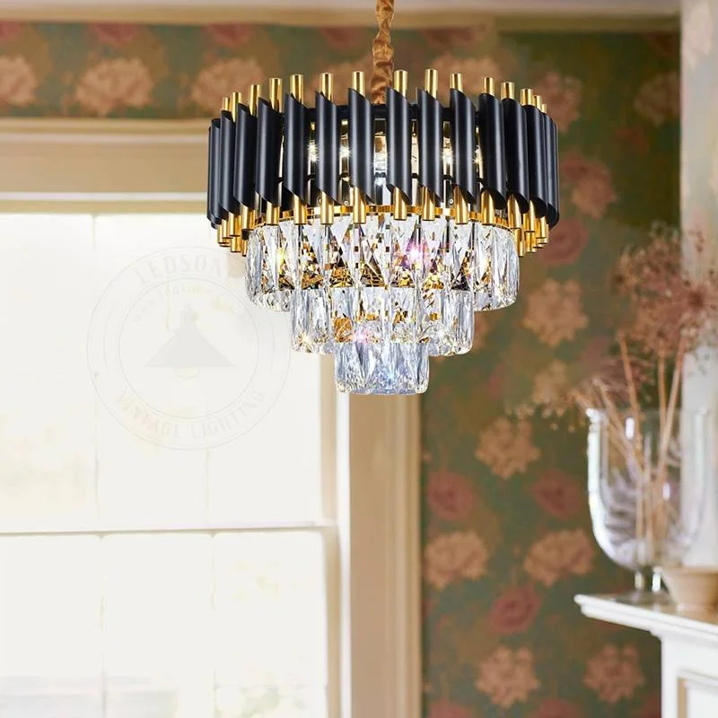 Black and gold adjustable chain chandelier with clear crystal body and black tube frame, ceiling mounted modern light fixture