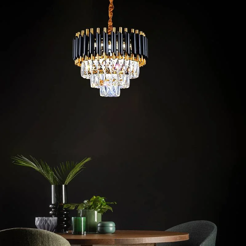 Modern black and gold chandelier with hanging clear crystals and adjustable chain, ceiling mounted for indoor use