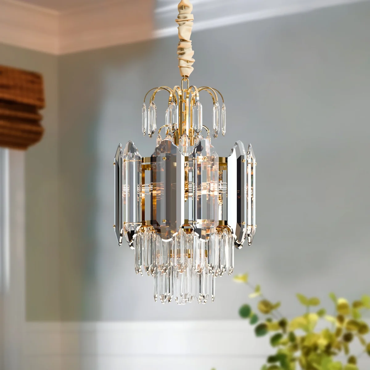 Modern crystal chandelier with multi-layered clear crystals and aluminium frame, ceiling-mounted in a contemporary style