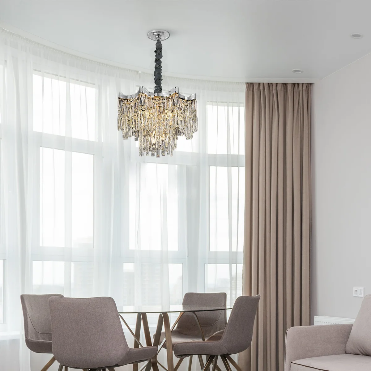 Modern crystal chandelier with gold crystal accents hanging from ceiling, round shape, suitable for living room lighting