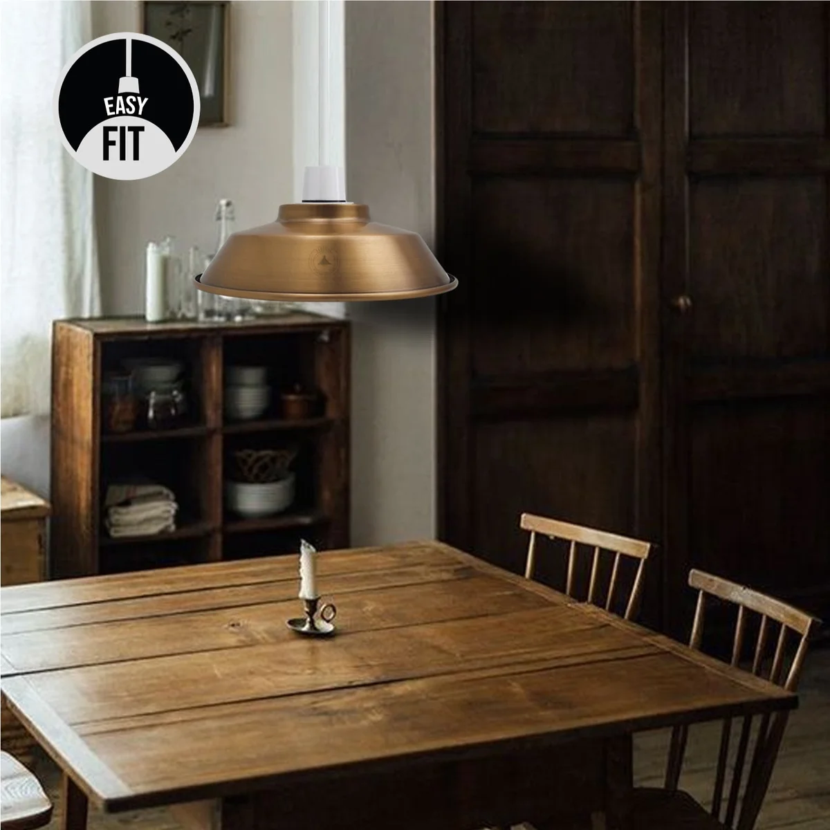 Yellow brass industrial style pendant light shade with dome shape and brushed finish hanging from ceiling