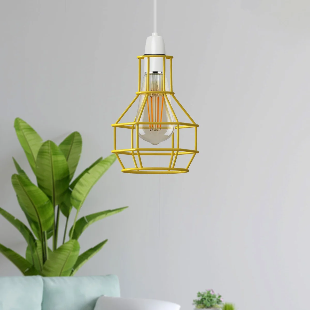 Vintage metal lamp shade in nest wire cage design, showing industrial style and metal construction details