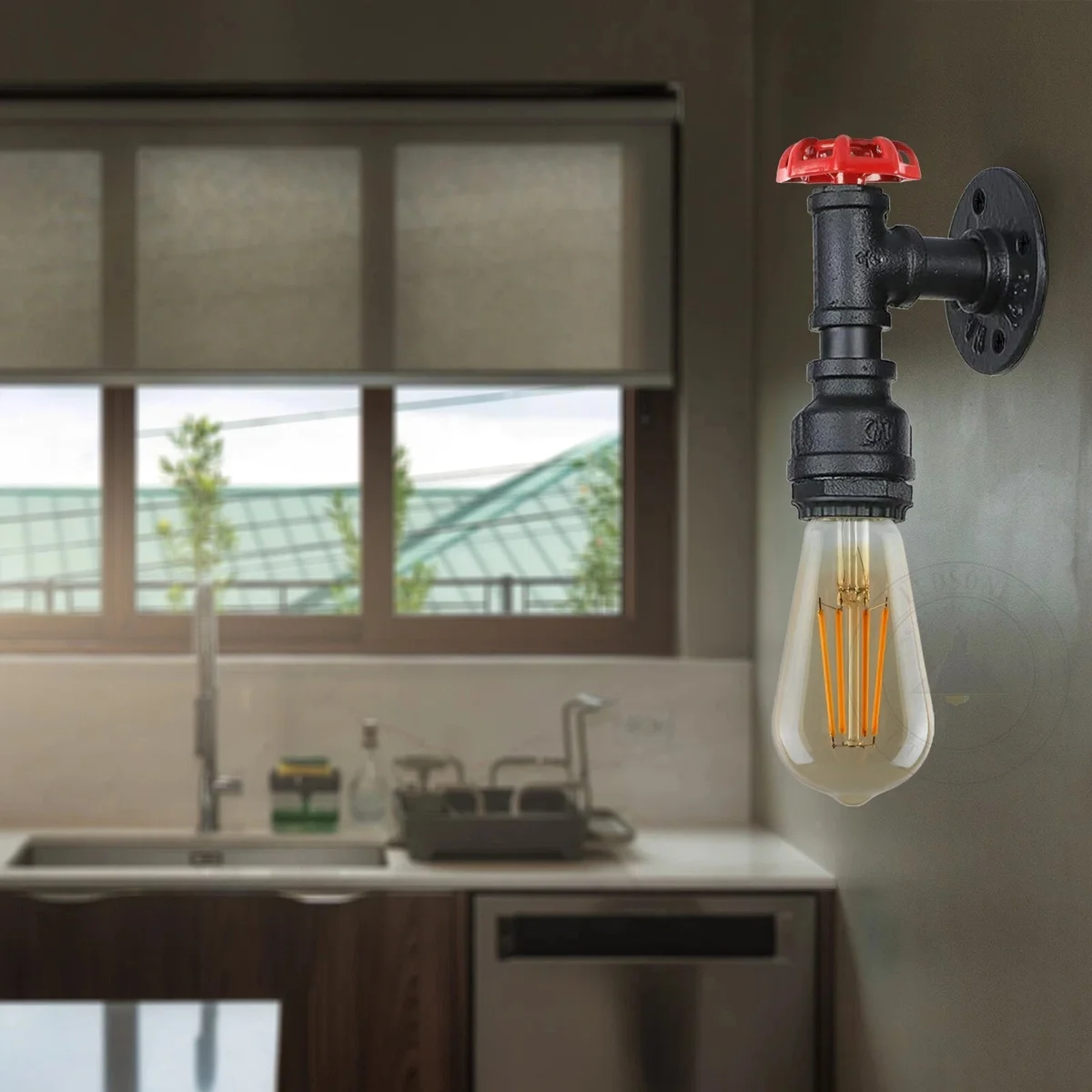 Black metal vintage wall sconce resembling a water pipe, featuring a wheel backing, mounted on wall