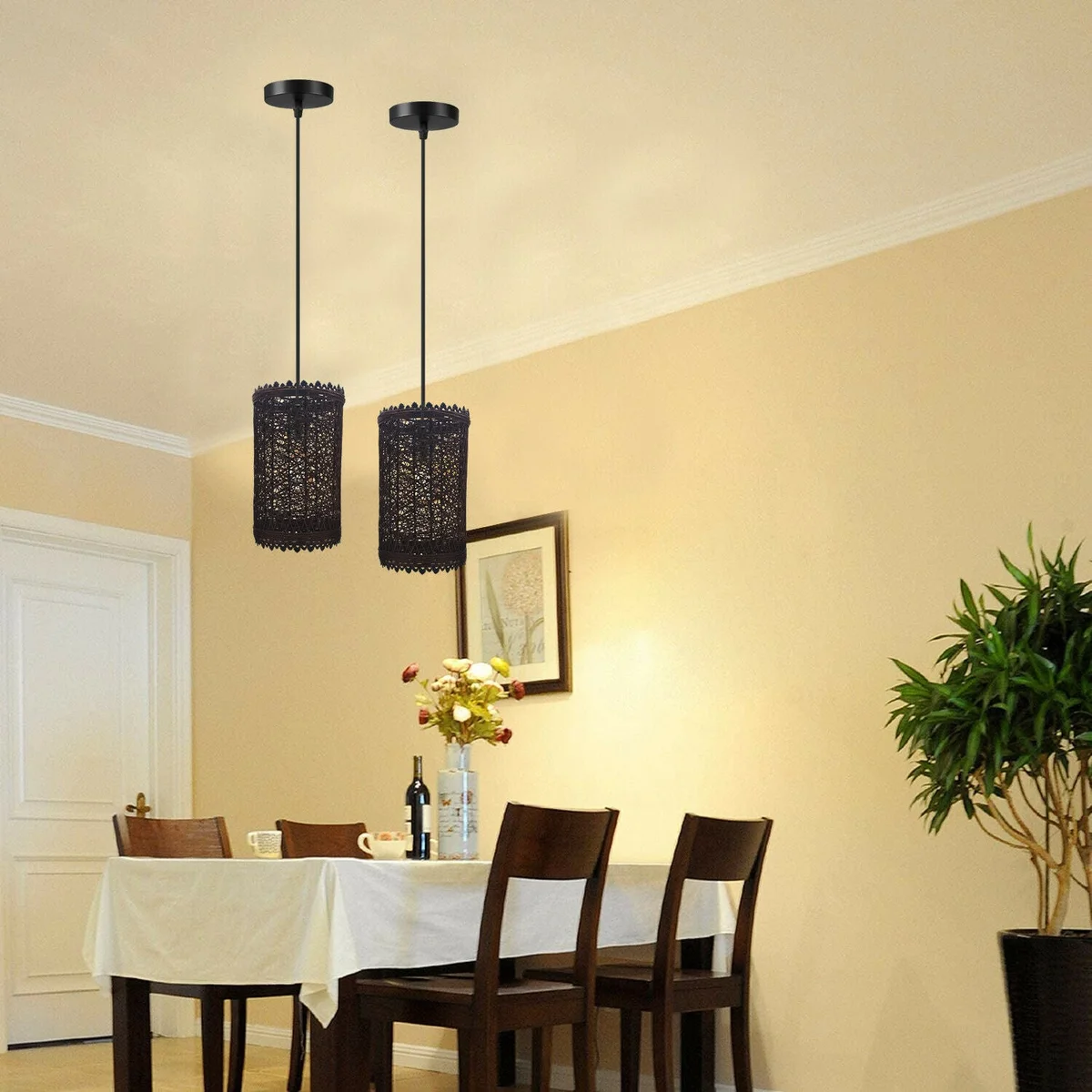 Brown rattan ceiling light pendant shade with metal frame and 95cm black PVC cable hanging from ceiling plate