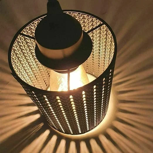 Rustic red metal wire drum indoor industrial lamp shade shown from side angle with open cage design and reducer plate attached