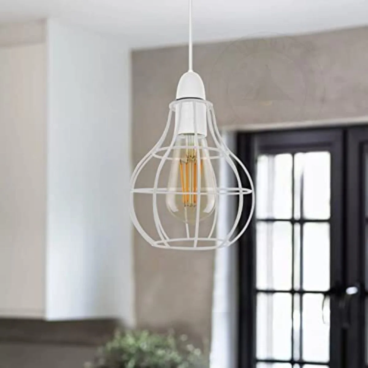White metal nest wire cage lamp with vintage Edison bulb, designed as a ceiling pendant light fixture