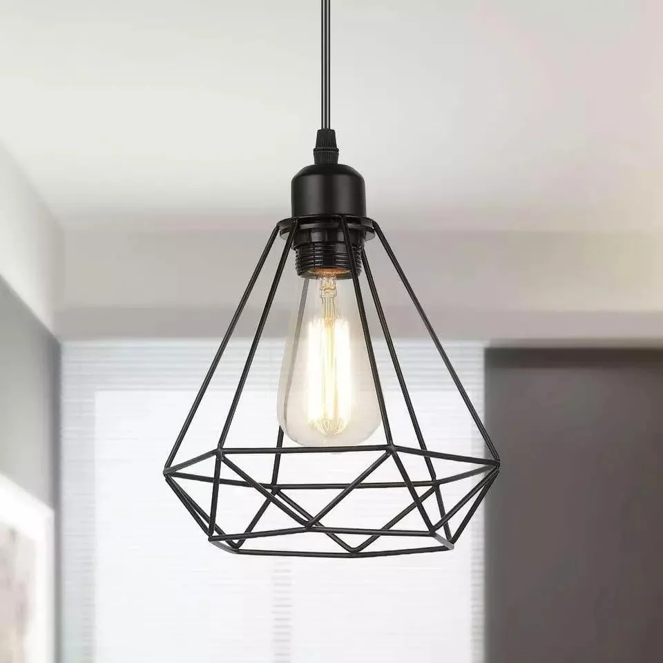 Black diamond pendant lampshade hanging indoors, showing diamond-shaped black metal wire cage design on ceiling light