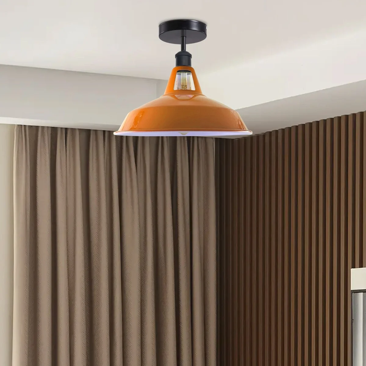 Orange metal lamp shade with slotted barn-style design, dome shape, and E27 fitting in a retro industrial finish