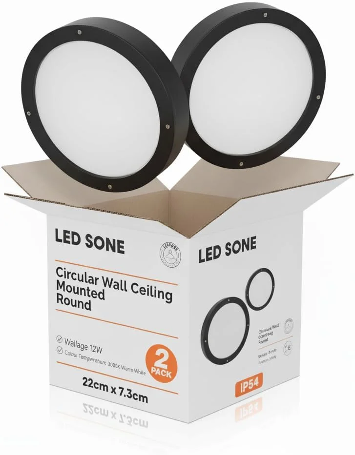 Two round IP54 outdoor LED bulkhead lights with warm white glow mounted on a white background