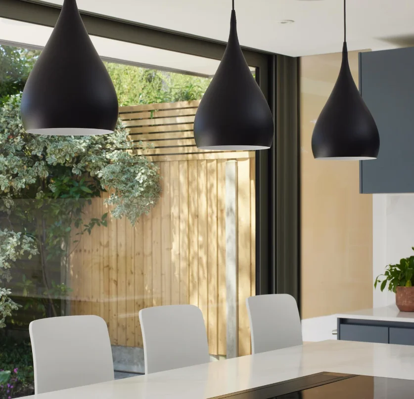 Iron ceiling shade in black with vintage tear-drop style, hanging pendant with plated finish.