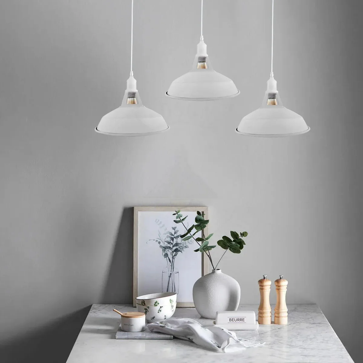 Vintage ceiling chandelier with three adjustable metal shades and hanging cords in industrial retro style against white background