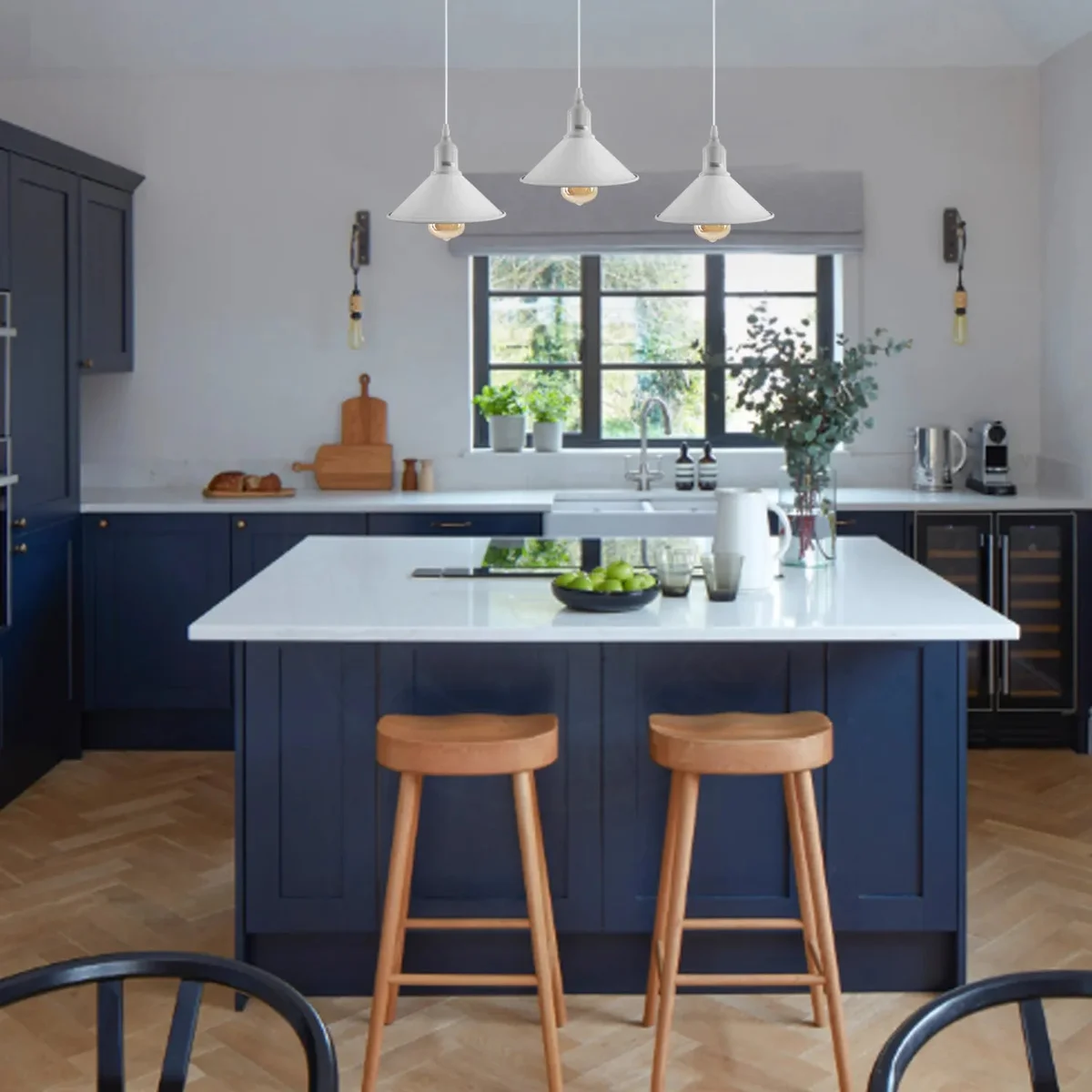 Three vintage pendant ceiling light fittings with metal shades and adjustable cords hanging indoors against a white background