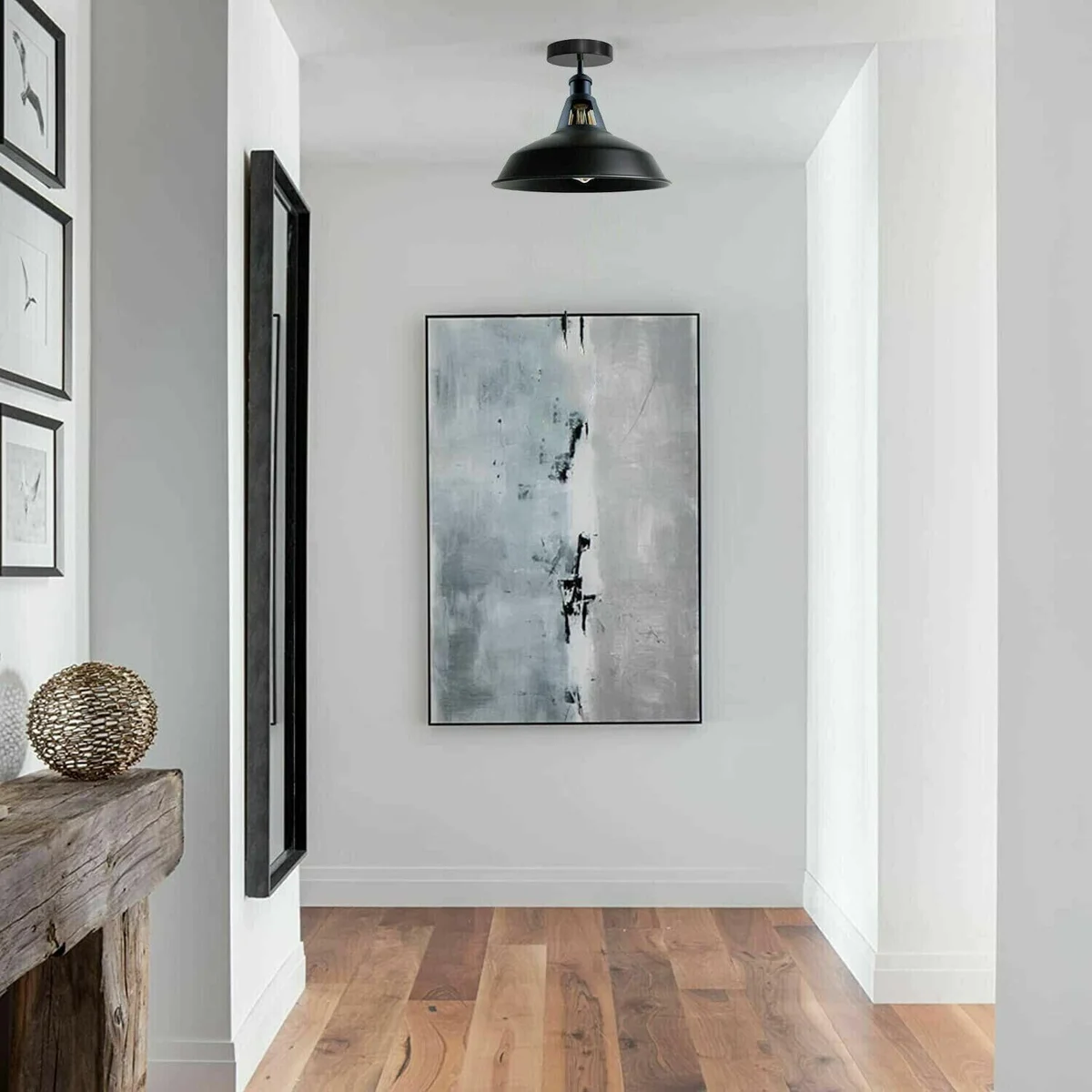 Black and white barn-style industrial metal pendant light shade with dome shape and E27 fitting on white background