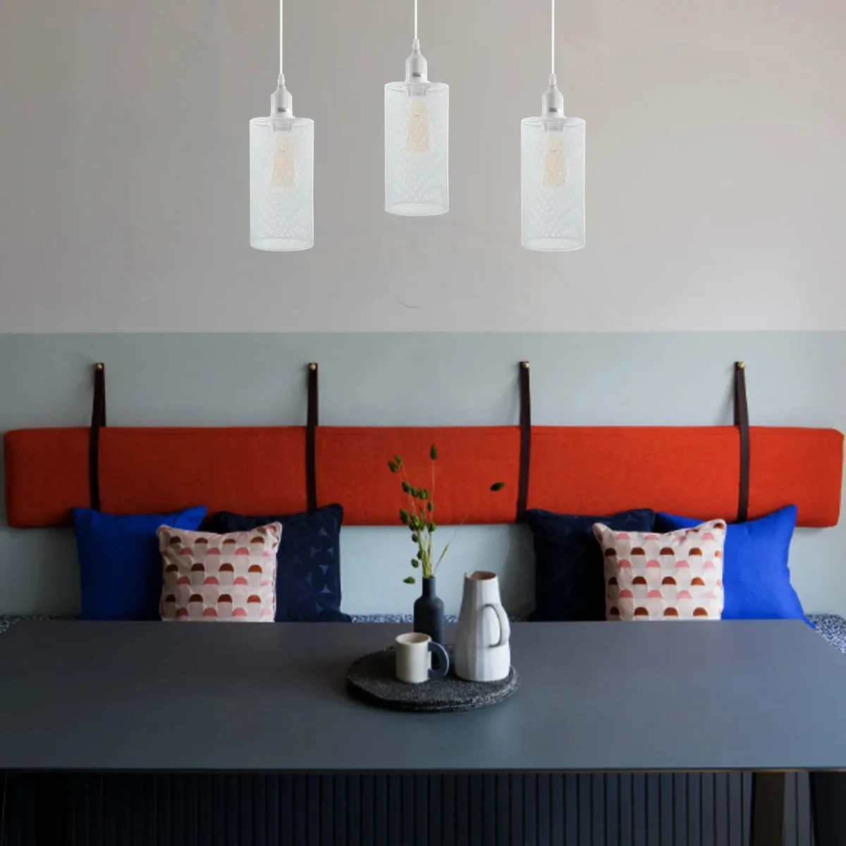 Three adjustable metal cage industrial pendant lighting fixtures with E27 sockets hanging from ceiling rose against white background