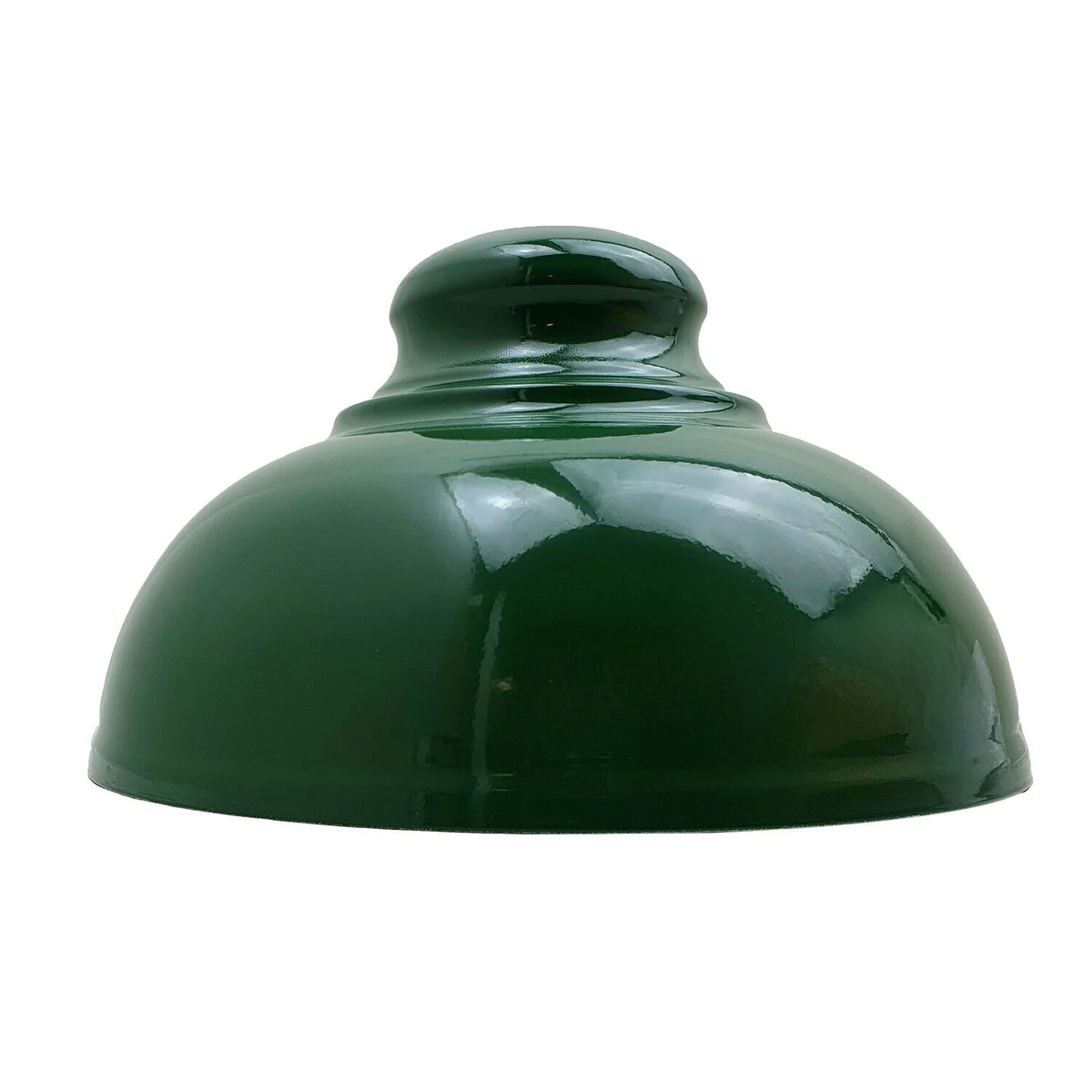 Green pendant lamp shade with retro metal design and concrete effect finish hanging from ceiling in industrial style room setting