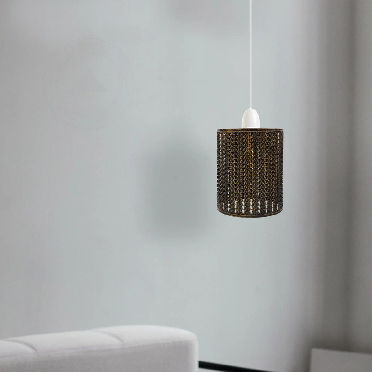 Brushed copper easy fit drum lampshade with industrial metal wire cage design, shown installed on ceiling socket