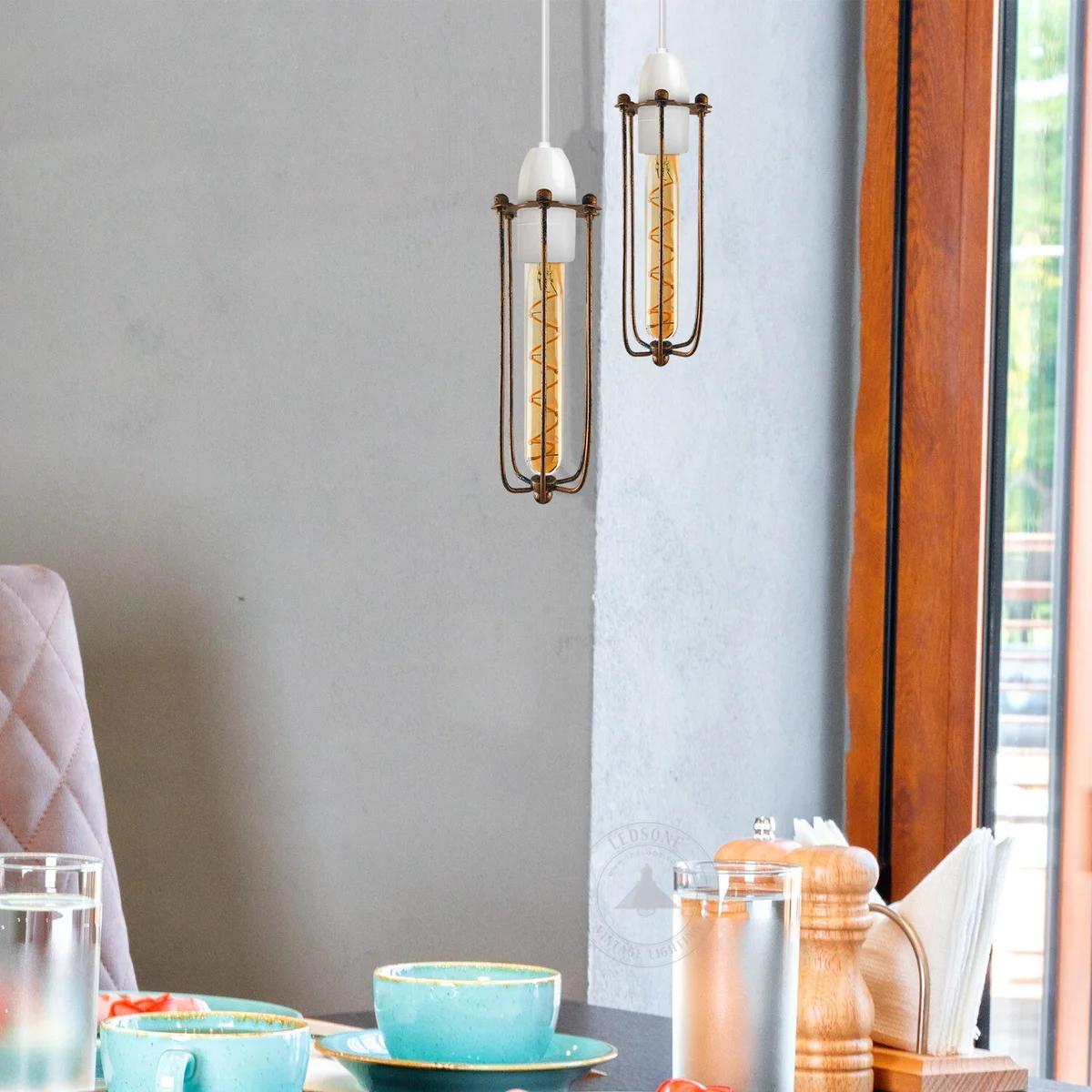 Long brushed copper pendant light with vintage industrial metal wire cage design for ceiling mounting indoors